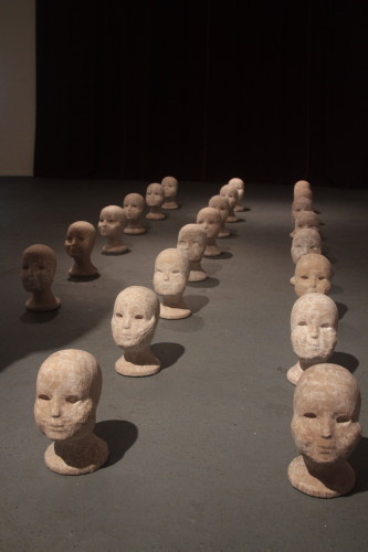 "Kinder" 2014 Paper mache on wig heads 22 heads representing the Hebrew alphabet Photo by Saul Sudin